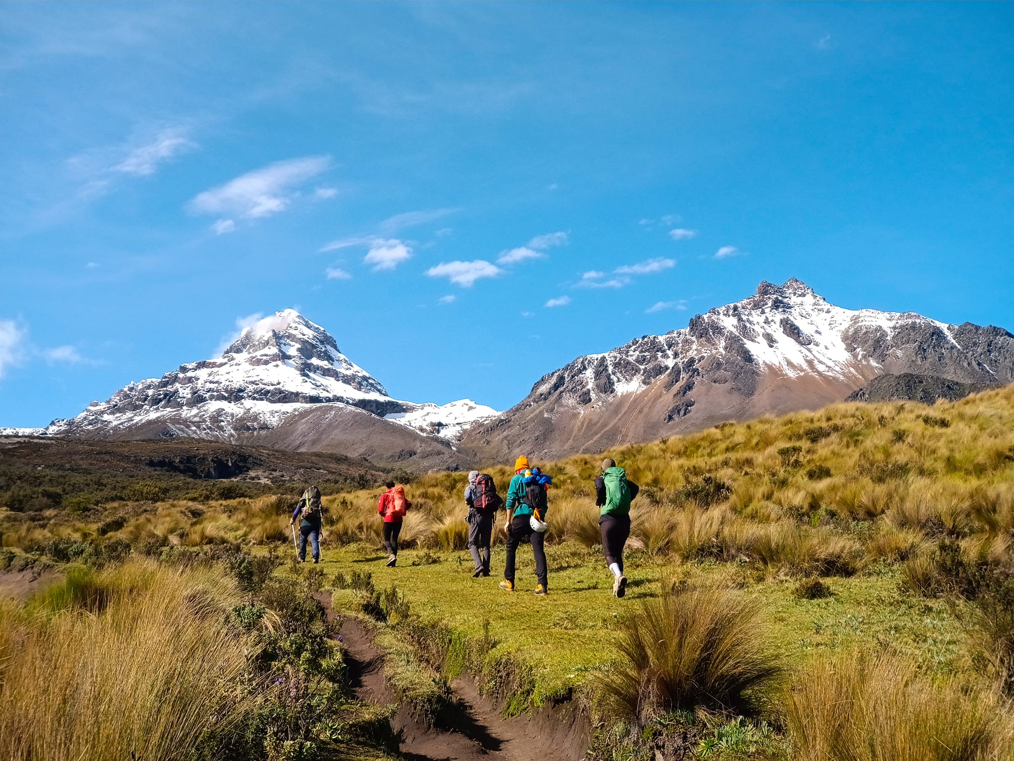 Iliniza Volcano Day Trek Hikers trekking through the high Andean landscape near the Iliniza volcanoes